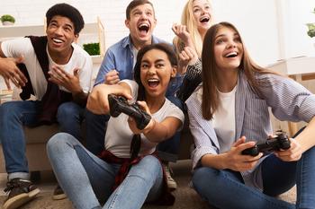3 Top Gaming Stocks to Buy in April: https://g.foolcdn.com/editorial/images/773050/group_playing_video_games-gettyimages-1182435064.jpg