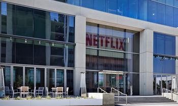 Netflix Buying Warner Bros: Terrible Mistake or Best Deal Ever?: https://g.foolcdn.com/editorial/images/847207/headquarters-with-netflix-logo-on-building_netflix.jpg