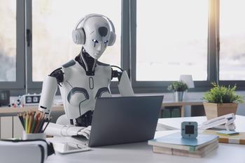 3 Top Artificial Intelligence (AI) Stocks to Buy in October: https://g.foolcdn.com/editorial/images/749394/a-robot-with-headphones-does-work-on-a-laptop.jpg