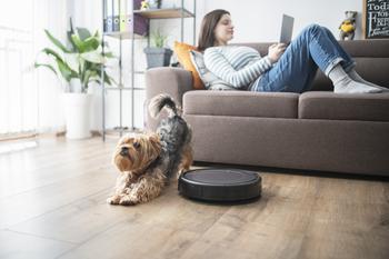 Here's the Latest on Amazon's Acquisition of iRobot at the End of 2023: https://g.foolcdn.com/editorial/images/756434/robot-vacuum-cleans-house.jpg