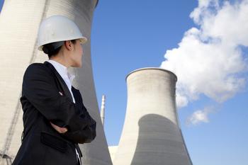 Why Shares of Uranium Energy, Cameco, and Energy Fuels Are Powering Higher Today: https://g.foolcdn.com/editorial/images/734720/engineer-stands-in-front-of-cooling-towers.jpg