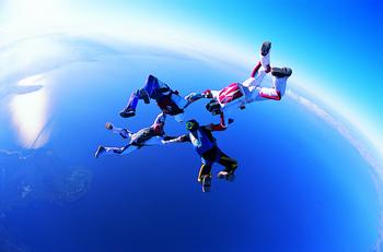 2 Stocks Down 90% and 95% You'll Wish You Had Bought on the Dip: https://g.foolcdn.com/editorial/images/736576/a-group-of-four-people-on-a-tandem-skydive.jpg