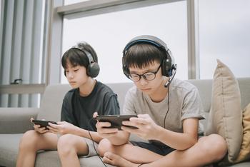 Why Tencent Stock Dropped Today: https://g.foolcdn.com/editorial/images/759219/brothers-playing-video-games-gaming.jpg