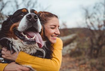 Charles Schwab Increases Its Stake in Chewy Stock. Should You Do the Same?: https://g.foolcdn.com/editorial/images/779037/happy-hugging-dog.jpg