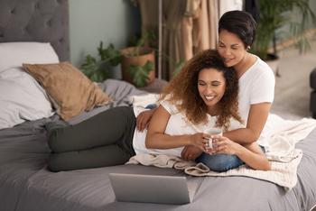 Is AvalonBay a Buy Right Now?: https://g.foolcdn.com/editorial/images/692026/22_04_21-two-people-in-a-bed-looking-at-a-computer-_gettyimages-1325853699.jpg