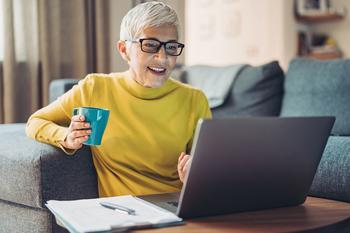 3 Moves You Absolutely Must Make a Year Before Retirement: https://g.foolcdn.com/editorial/images/748358/older-woman-at-laptop_gettyimages-1282165085.jpg