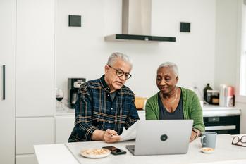Social Security: 3 Nearly Effortless Moves to Make in 2024.: https://g.foolcdn.com/editorial/images/759003/two-people-sitting-in-a-kitchen-looking-at-a-laptop.jpg