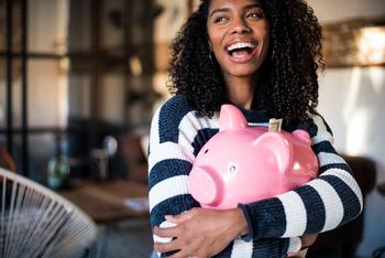 2 Bank Stocks to Buy Before the Market Recovers: https://g.foolcdn.com/editorial/images/689678/22_06_30-a-person-hugging-a-piggy-bank-_gettyimages-1040557630.jpg