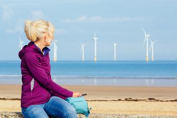 Dominion Energy's Giant Wind Farm Project Just Hit a Big Snag: https://g.foolcdn.com/editorial/images/701688/22_01_17-a-person-on-a-beach-looking-at-offshore-wind-turbines-_gettyimages-1341429320.jpg