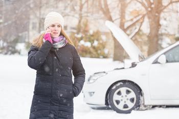 Why Rivian, Lucid, and Freyr Stocks Just Dropped: https://g.foolcdn.com/editorial/images/761497/woman-in-hat-scarf-and-coat-phones-for-help-next-to-a-broken-down-car-in-a-snowstorm.jpg