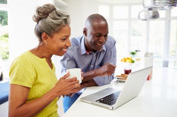 How to Find Out Exactly How Much You'll Get From Social Security in Retirement: https://g.foolcdn.com/editorial/images/699264/mature-man-and-woman-sitting-in-kitchen-looking-at-laptop-computer-and-smiling-couple-poc.jpg