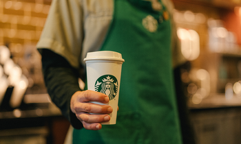 Starbucks: Buy, Sell, or Hold?: https://g.foolcdn.com/editorial/images/774623/starbucks_employee_holding_cup_with_logo_sbux.png