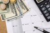 2 No-Brainer Dividend Stocks to Buy Right Now: https://g.foolcdn.com/editorial/images/841217/dollar-bills-and-coins-on-a-calendar.jpg