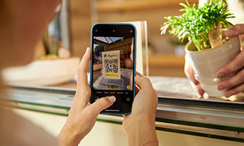 These 2 Sector Powerhouses Just Declared Dividend Raises: https://g.foolcdn.com/editorial/images/840708/person-buying-plant-using-paypal-qr-code-on-phone_paypal.jpg