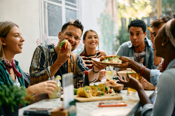 This Stock Is Down 87%, but It Could Soar Up to 186%, According to Wall Street: https://g.foolcdn.com/editorial/images/839047/people-eating-premium-food-outside.jpg