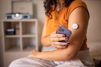DexCom Stock Just Fell to a 5-Year Low. Is It a No-Brainer Buy at This Price?: https://g.foolcdn.com/editorial/images/841661/someone-using-their-phone-to-check-their-glucose-levels.jpg