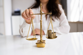 Better Stablecoin Buy: PayPal USD vs. Ripple USD: https://g.foolcdn.com/editorial/images/842670/balancing-money-on-golden-scales.jpg
