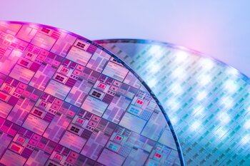 Better Semiconductor Stock: TSMC vs. ASML: https://g.foolcdn.com/editorial/images/842743/two-silicon-wafers.jpg