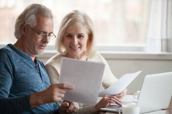 Which 13 States Don't Tax Retirement Income?: https://g.foolcdn.com/editorial/images/842739/retired-couple-looks-at-papers.jpg