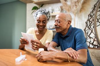 7 Things You Probably Didn't Know You Could Spend Your FSA Funds On: https://g.foolcdn.com/editorial/images/843601/couple-sitting-at-table-looking-at-document.jpg