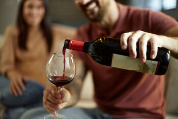 1 Magnificent S&P 500 Dividend Stock Down 52% to Buy and Hold Forever: https://g.foolcdn.com/editorial/images/843652/pouring-glass-of-wine.jpg