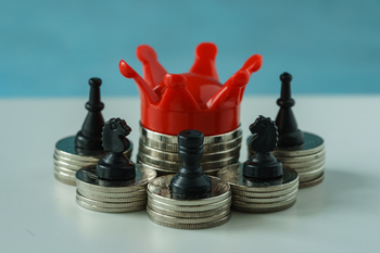 Which 'Dividend Prince' Will Become The Next King In 2 Years?: https://g.foolcdn.com/editorial/images/843825/a-crown-on-a-stack-of-coins.jpg