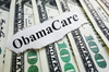 Why Centene Stock Just Popped: https://g.foolcdn.com/editorial/images/844362/obamacare-written-on-a-slip-of-paper-laid-atop-a-row-of-100-bills.jpg