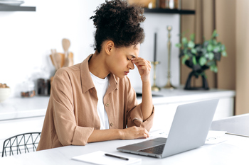 3 Things Investors Need to Know About Cardano: https://g.foolcdn.com/editorial/images/840153/unhappy-investor-works-on-a-laptop-at-a-dining-table.jpg