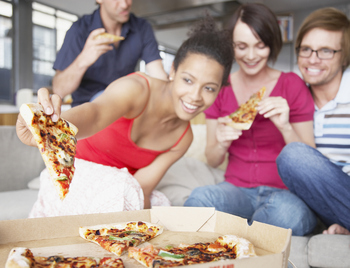 Has DPZ Stock Been Good for Investors?: https://g.foolcdn.com/editorial/images/843995/friends-eat-pizza-in-a-home-setting.jpg