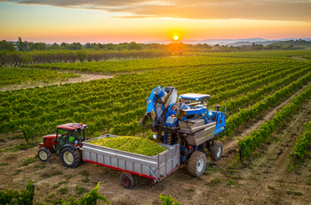 Why Titan Machinery Stock Thrashed the Market on Tuesday: https://g.foolcdn.com/editorial/images/844576/a-grape-harvester-depositing-into-a-truck.jpg