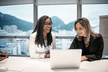 Has MELI Stock Been Good for Investors?: https://g.foolcdn.com/editorial/images/843989/two-business-people-collaborate-in-an-office-with-the-mountains-of-rio-de-janeiro-in-the-background.jpg