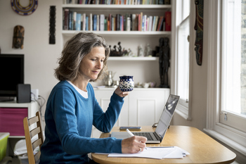 Have $2,000 to Invest? Here Are 4 of My Favorite Dividend Stocks for the Next 5 Years: https://g.foolcdn.com/editorial/images/829121/drinking-coffee-using-laptop.jpg