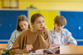 What to Know Before Buying Nano Nuclear Energy Stock: https://g.foolcdn.com/editorial/images/843154/students-sit-at-desks-in-classroom.jpg