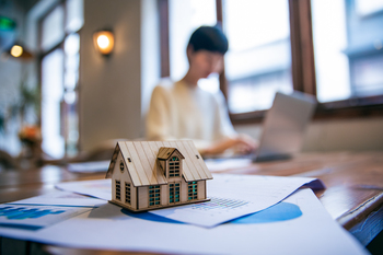 Should You Buy AGNC Investment While It's Below $11?: https://g.foolcdn.com/editorial/images/844705/a-model-home-sits-on-a-desk-with-a-person-working-in-the-back-getty.jpg