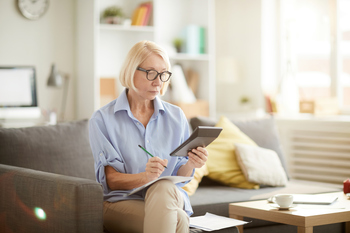 This Is the Average 401(k) Balance for Retirees Age 55 and Older: https://g.foolcdn.com/editorial/images/843067/older-woman-sitting-on-a-couch-looking-at-a-calculator.jpg