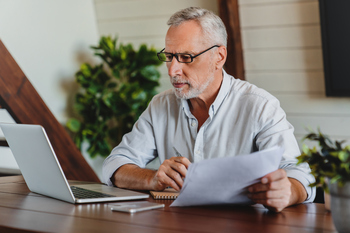 Medicare Part B Premiums Are Rising in 2026. Here's What to Expect.: https://g.foolcdn.com/editorial/images/844920/older-man-laptop-holding-papers-gettyimages-1264327699.jpg