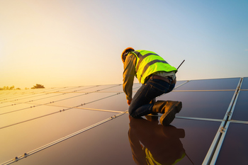 The Utility Stock That's Actually Exciting: https://g.foolcdn.com/editorial/images/843948/a-person-installing-solar-panels.jpg