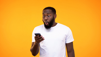 The Cryptocurrency That Could Be About to Explode 1,000%: https://g.foolcdn.com/editorial/images/843926/surprised-investor-with-phone.jpg