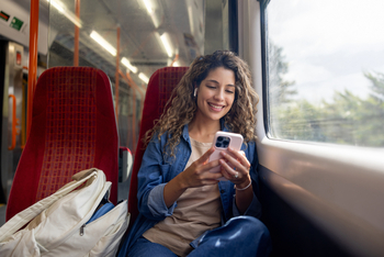 Ranking the Best "Magnificent Seven" Stocks to Buy for 2026. Here's My No. 2 Pick.: https://g.foolcdn.com/editorial/images/845349/a-person-smiles-while-looking-at-their-cell-phone-on-a-train.jpg