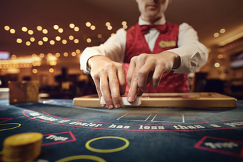 Here's How CZR Stock Could Up the Ante in 2026: https://g.foolcdn.com/editorial/images/845341/dealer-at-casino-gaming-table.jpg