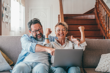 What's One of the Best ETFs to Buy Right Now?: https://g.foolcdn.com/editorial/images/843046/2-people-excited-with-a-computer.jpg