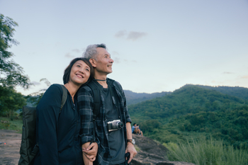4 Ways Working Beyond Your Full Retirement Age (FRA) Can Boost Your Social Security Checks: https://g.foolcdn.com/editorial/images/845625/smiling-senior-couple-out-hiking.jpg