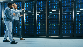 Forget Iren's Explosive Growth: Buy This Better Long-Term Stock Instead: https://g.foolcdn.com/editorial/images/842987/workers-walking-through-a-data-center.jpg