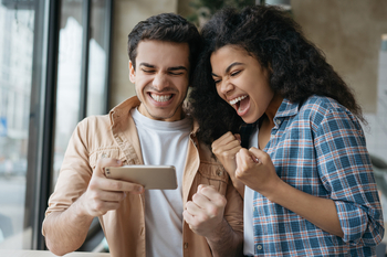 My Top 10 Stocks to Buy in 2025 Are Beating the Market by 8 Percentage Points. Should You Buy Them for 2026?: https://g.foolcdn.com/editorial/images/845980/2-people-looking-at-a-cellphone-excited.jpg