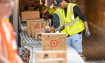 Where Will Target Stock Be in 1 Year?: https://g.foolcdn.com/editorial/images/847292/boxes-with__target-logo-on-a-conveyor-belt_target.jpg