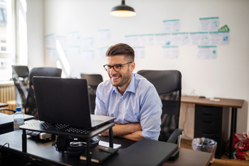 Got $2,000? 2 Top Growth Stocks to Buy That Could Double Your Money: https://g.foolcdn.com/editorial/images/847242/business-person-sitting-in-office-smiling-and-looking-at-computer-screen.jpg