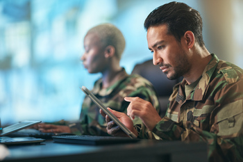 Why AI Stock BigBear.ai Holdings Flew 11% Higher on Friday: https://g.foolcdn.com/editorial/images/848313/person-in-the-military-using-a-tablet-computer.jpg
