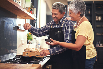 Have an RMD Coming Your Way This December? 3 Ways to Make the Most of It.: https://g.foolcdn.com/editorial/images/847311/two-people-cooking_gettyimages-488675514.jpg