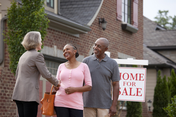 The Federal Reserve Just Delivered Spectacular News for This Under-the-Radar Real Estate Stock: https://g.foolcdn.com/editorial/images/847870/a-real-estate-agent-standing-with-their-clients-outside-their-home-preparing-to-list-it-for-sale.jpg