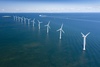 Why Did Dominion Energy Stock Plunge Today?: https://g.foolcdn.com/editorial/images/848455/line-of-wind-turbines-in-the-ocean.jpg